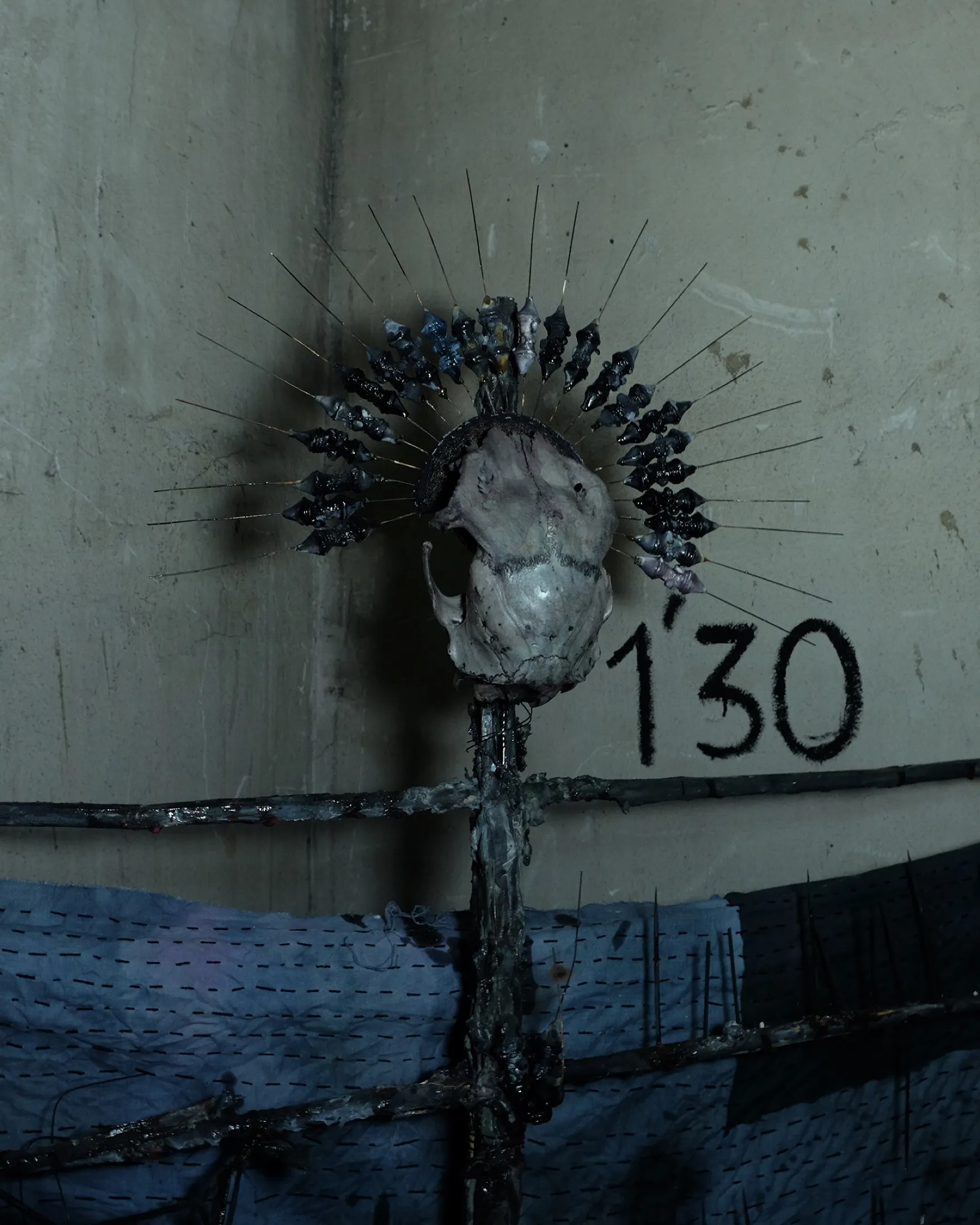 Godsend (energy drain 1) — 2023, Cane, plaster, deer skull, ink, fabric, wire, jute rope, motor, blood collection tube, human blood, incense, 200 × 150 cm, by Taka Kono